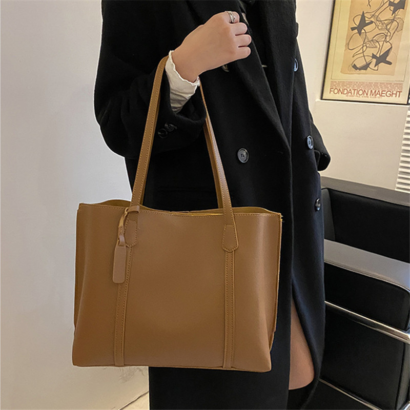 Classic Black Faux Leather Tot - đánh giá và giá Leather Work Handbags For Women